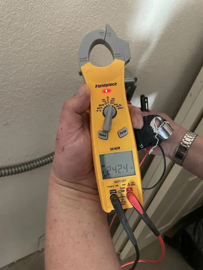 Voltage testing with clamp meter during Hot Tub / Pool Electrical Wiring in Sherman